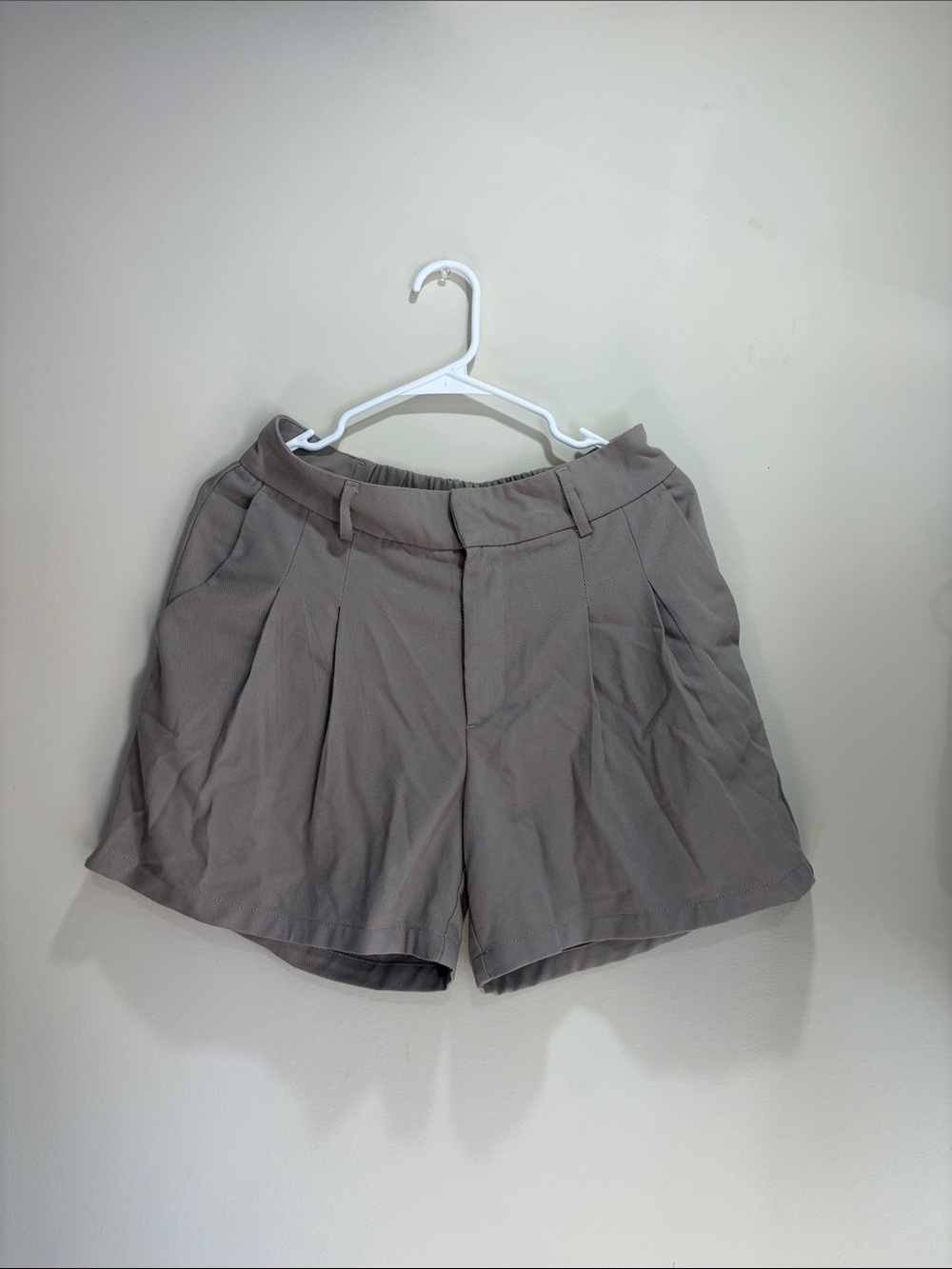 Urban Outfitters High-Waist Pleated Women’s Shorts in Taupe
